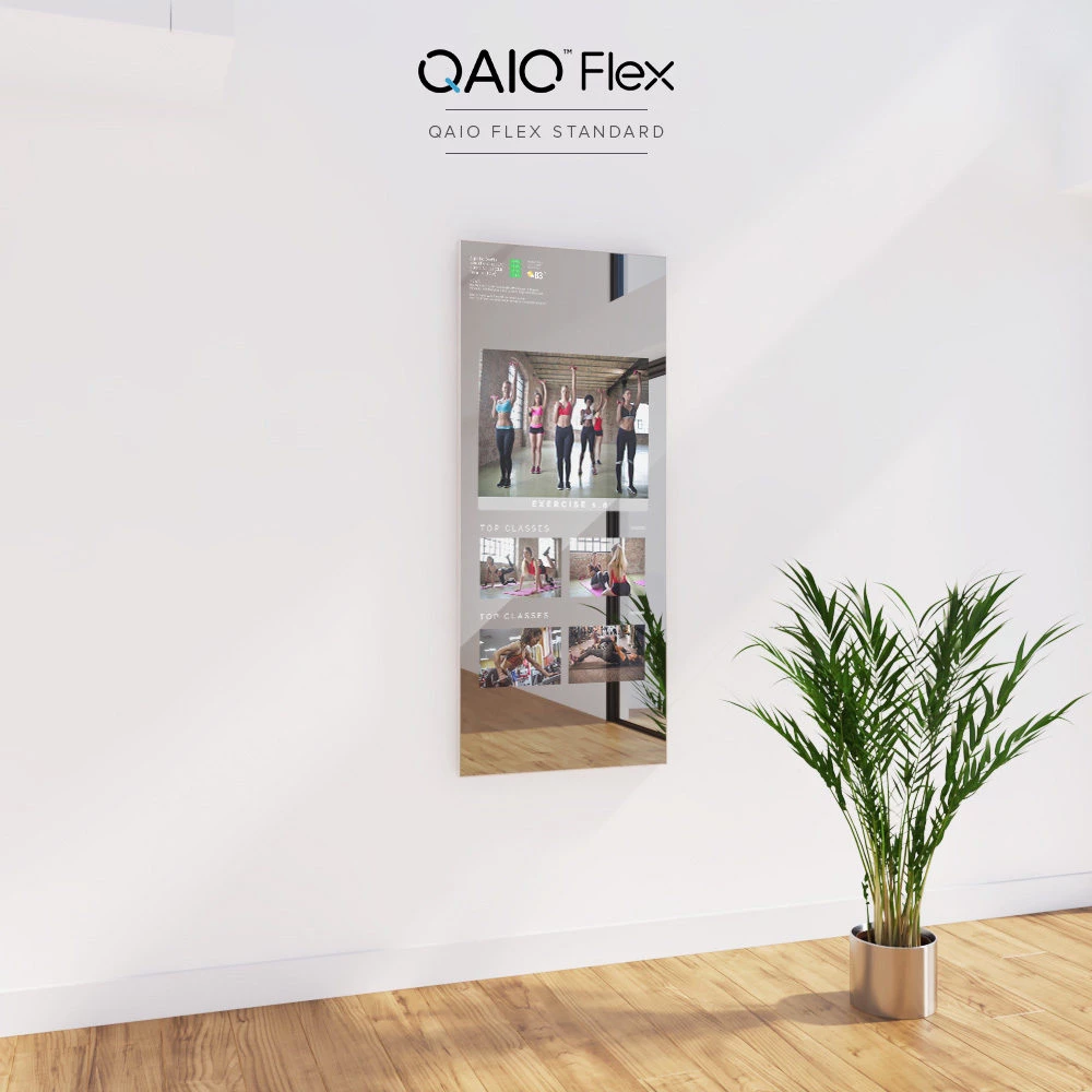 Sleek QAIO Flex Fitness Mirror Standard, showcased in a minimalist background in Ras Al Khaimah.